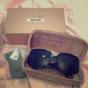 Miu Miu acetate black sunglsses